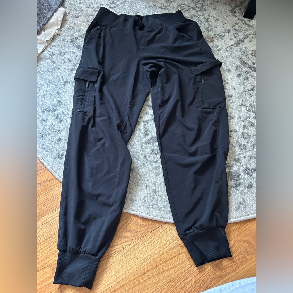 Women’s stretch woven tapered cargo pants - all in motion.